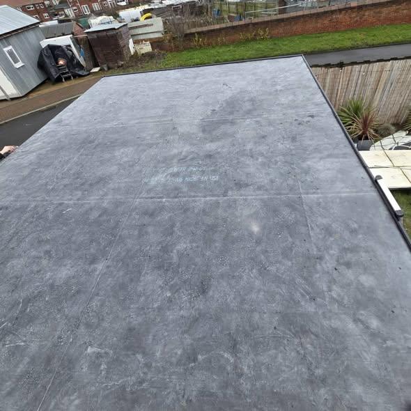 grey rubber roof on a garden room